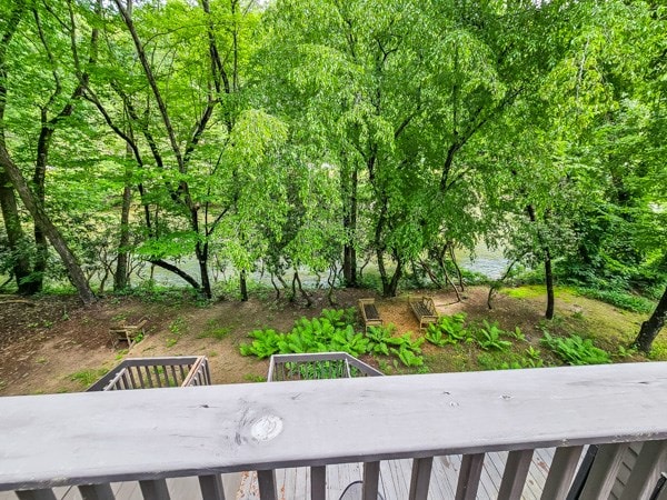 view of yard with a balcony