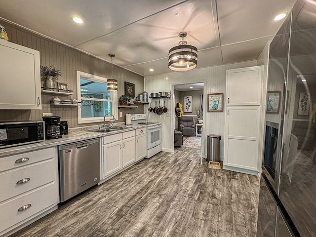 390 Pinebark Ln, Murphy, NC 28906 - kitchen featuring stainless steel dishwasher, electric range, open shelves, a sink, and white cabinetry