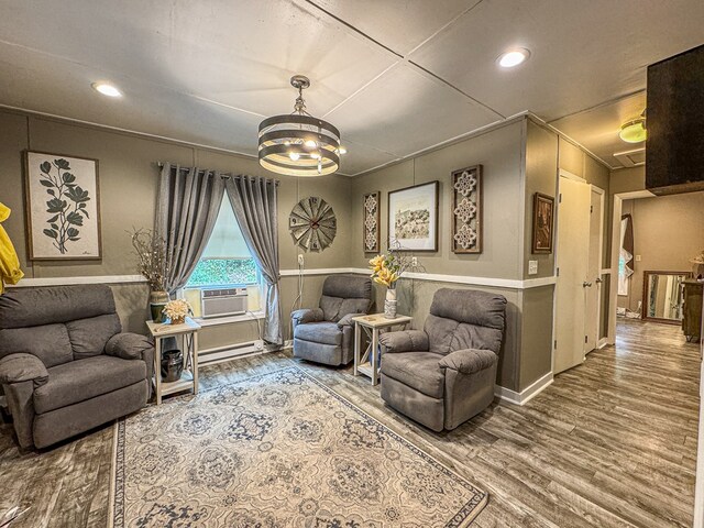 390 Pinebark Ln, Murphy, NC 28906 - living area featuring wood finished floors, a baseboard heating unit, recessed lighting, a chandelier, and baseboards