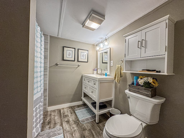 390 Pinebark Ln, Murphy, NC 28906 - bathroom featuring wood finished floors, toilet, vanity, and crown molding