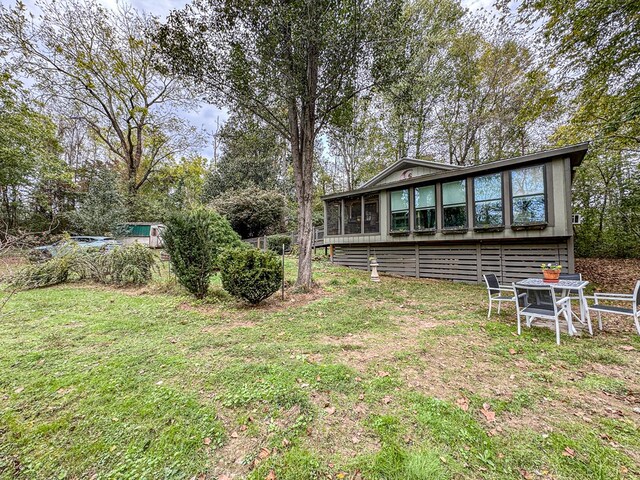 390 Pinebark Ln, Murphy, NC 28906 - view of grassy yard with a sunroom
