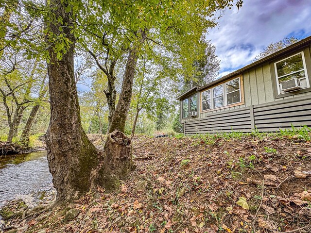 390 Pinebark Ln, Murphy, NC 28906 - view of side of home with cooling unit and board and batten siding