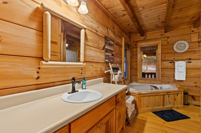 bathroom with beam ceiling, wood ceiling, wood-type flooring, wood walls, and a garden tub