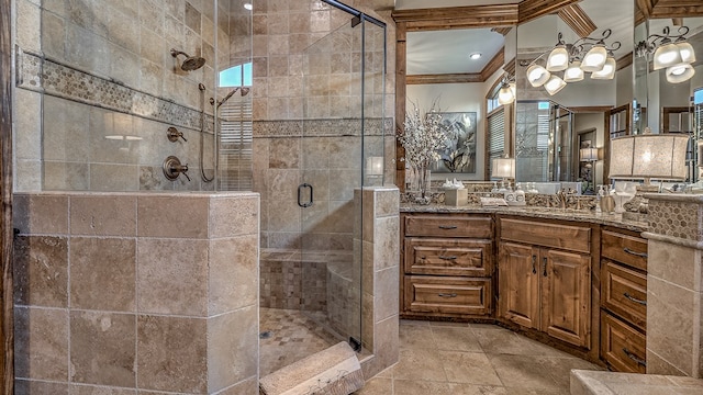 bathroom with a whirlpool tub, visible vents, vanity, and baseboards