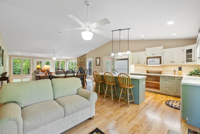 76 Misty River Ln, Hayesville, NC 28904 - living area featuring ceiling fan, recessed lighting, light wood-type flooring, and high vaulted ceiling