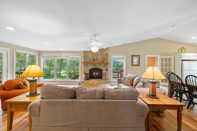 76 Misty River Ln, Hayesville, NC 28904 - living area with light wood-style flooring, ceiling fan, a fireplace, and vaulted ceiling