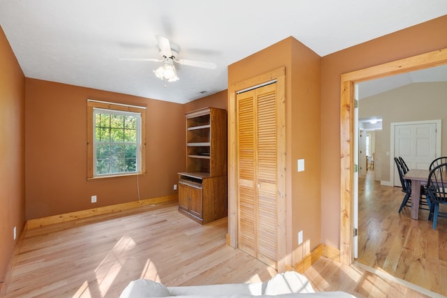 76 Misty River Ln, Hayesville, NC 28904 - unfurnished bedroom featuring light wood-style flooring, a closet, and a ceiling fan