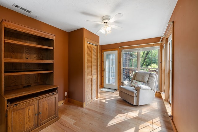 76 Misty River Ln, Hayesville, NC 28904 - sitting room with light wood-style floors and ceiling fan