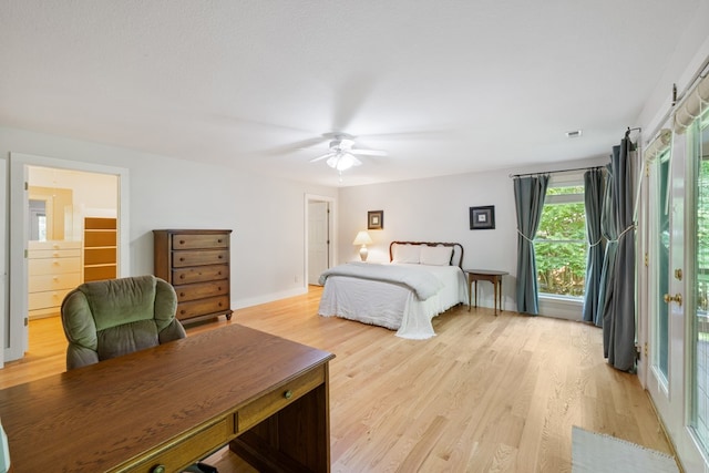 76 Misty River Ln, Hayesville, NC 28904 - bedroom with light wood-style flooring and ceiling fan