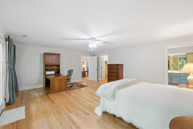 76 Misty River Ln, Hayesville, NC 28904 - bedroom featuring light wood-type flooring, an office area, ensuite bathroom, and ceiling fan