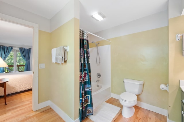 76 Misty River Ln, Hayesville, NC 28904 - full bath with wood finished floors, shower / bathtub combination with curtain, vanity, and ensuite bathroom