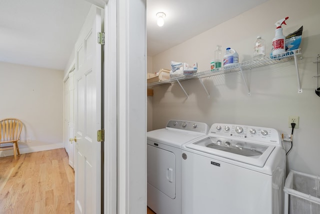 76 Misty River Ln, Hayesville, NC 28904 - laundry area featuring independent washer and dryer and light wood-style flooring