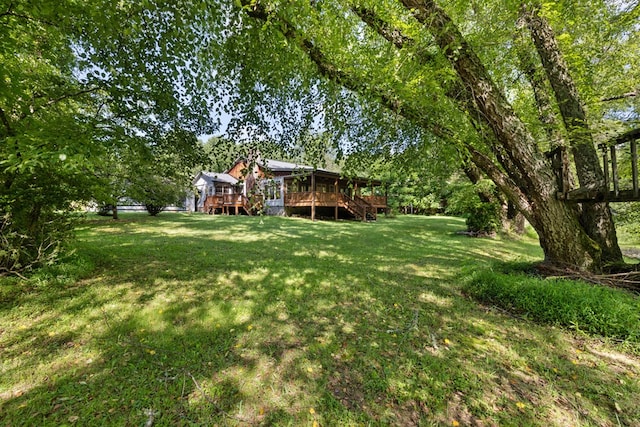 76 Misty River Ln, Hayesville, NC 28904 - view of grassy yard with a deck and stairs