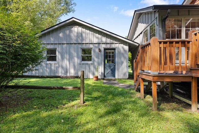 76 Misty River Ln, Hayesville, NC 28904 - back of house featuring board and batten siding, a yard, and a wooden deck