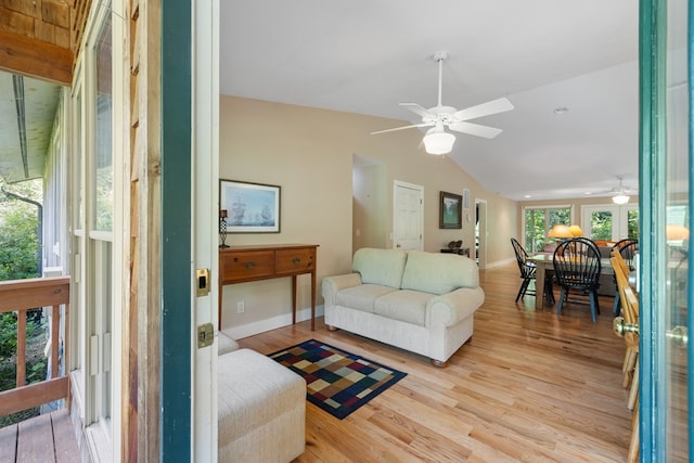76 Misty River Ln, Hayesville, NC 28904 - living room featuring a ceiling fan, vaulted ceiling, and wood finished floors