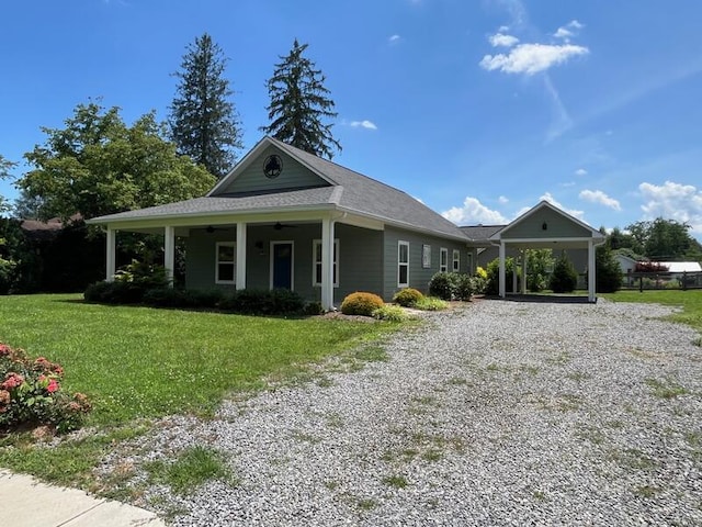 28 Arlington St, Hayesville, NC 28904 - view of front of home with gravel driveway, a front lawn, and a carport