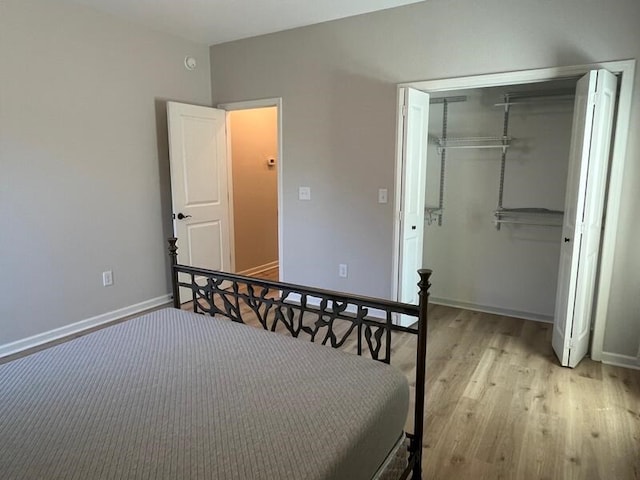28 Arlington St, Hayesville, NC 28904 - bedroom featuring light wood-type flooring and a closet