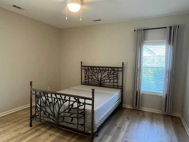 28 Arlington St, Hayesville, NC 28904 - bedroom with wood finished floors and a ceiling fan