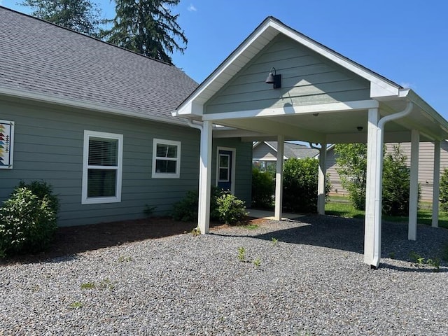 28 Arlington St, Hayesville, NC 28904 - rear view of property featuring driveway, a carport, and a shingled roof