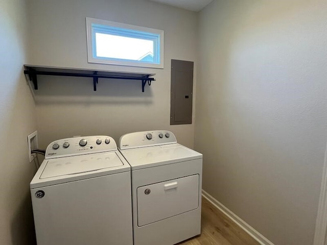 28 Arlington St, Hayesville, NC 28904 - laundry area featuring electric panel, washer and dryer, and light wood-style floors