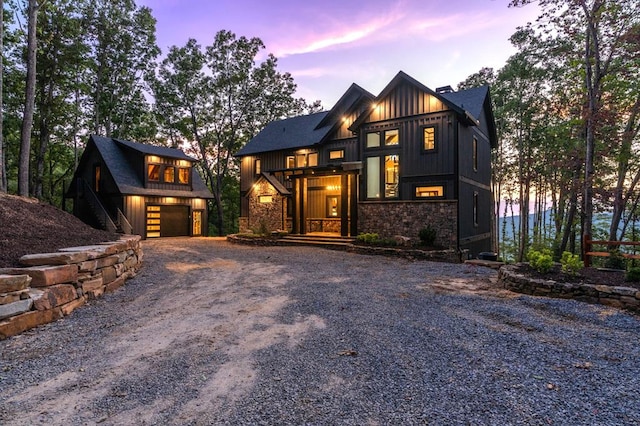 modern inspired farmhouse with a garage