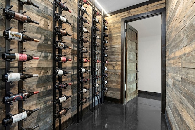 wine area with wooden walls