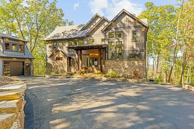 view of front of property with a garage