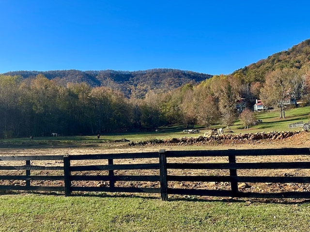 view of mountain feature with a rural view