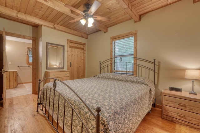 119 Blair Oaks Dr, Blairsville, GA 30512 - bedroom featuring a wooden ceiling with exposed beams, light wood-style floors, and a ceiling fan