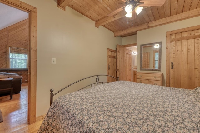 119 Blair Oaks Dr, Blairsville, GA 30512 - bedroom featuring a wood ceiling with exposed beams, light wood-type flooring, a ceiling fan, and a closet