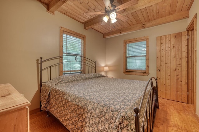 119 Blair Oaks Dr, Blairsville, GA 30512 - bedroom with a wooden ceiling with exposed beams, light wood finished floors, and ceiling fan