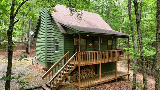 119 Blair Oaks Dr, Blairsville, GA 30512 - rustic home with a wooden deck, a forest view, and stairs