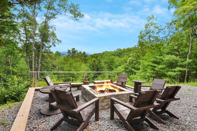 view of patio featuring a fire pit