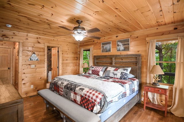 bedroom with multiple windows, wood ceiling, ceiling fan, and hardwood / wood-style flooring