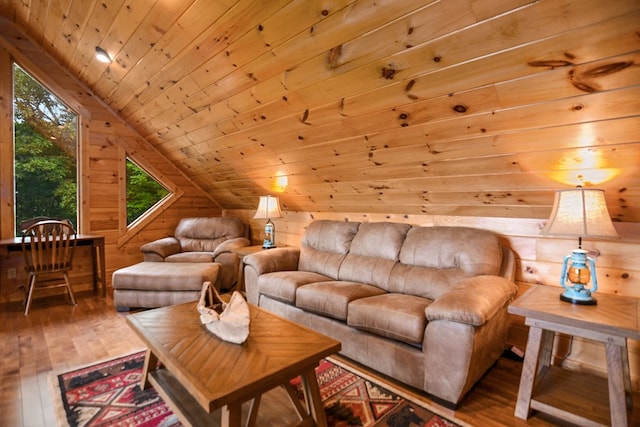 living room with lofted ceiling, wooden ceiling, and wood walls