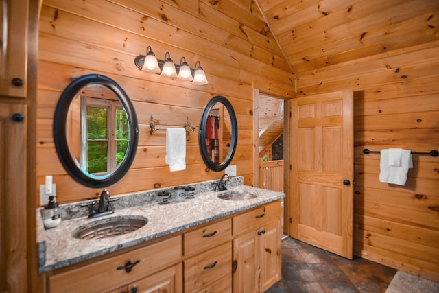 bathroom with wooden ceiling, vanity, vaulted ceiling, and wood walls