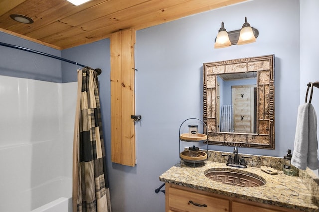 bathroom with vanity, shower / tub combo with curtain, and wood ceiling