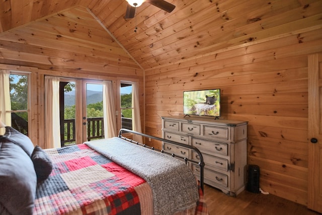 bedroom with wood walls, wood ceiling, access to outside, hardwood / wood-style flooring, and ceiling fan