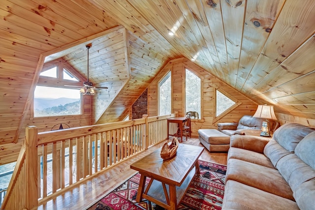 interior space featuring a wealth of natural light, hardwood / wood-style floors, and wooden ceiling