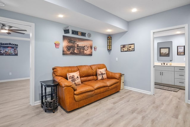 living area featuring light wood-style flooring, baseboards, recessed lighting, and ceiling fan