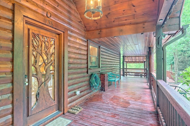 wooden deck featuring a porch