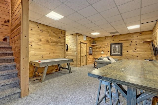 game room with a drop ceiling and carpet floors