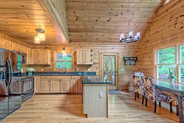 kitchen featuring decorative light fixtures, stove, light brown cabinetry, and black refrigerator with ice dispenser