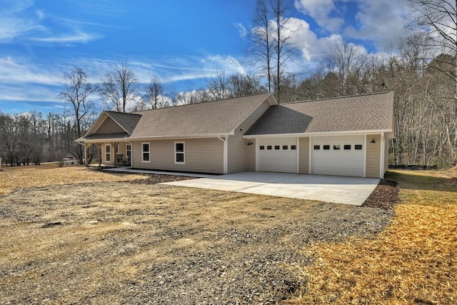 ranch-style house featuring a garage