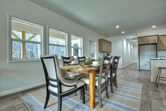 dining room with dark wood-type flooring