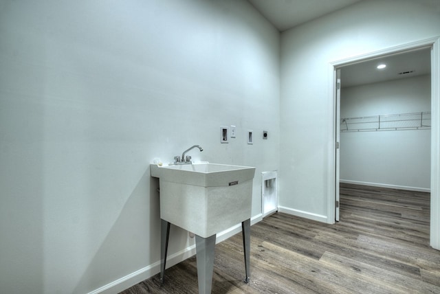 bathroom with wood-type flooring