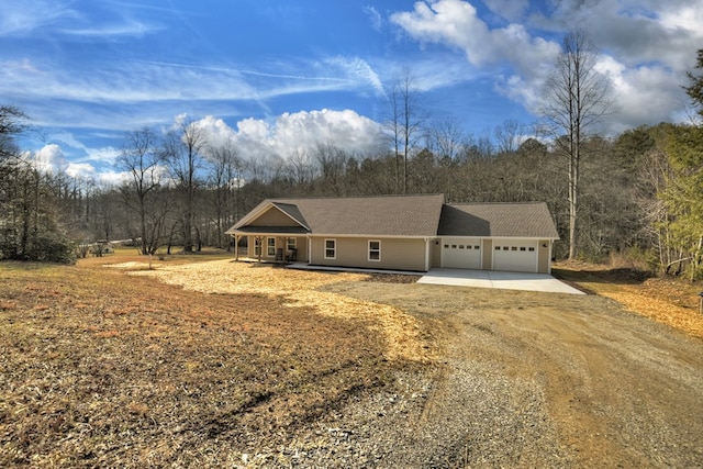 ranch-style home with a garage