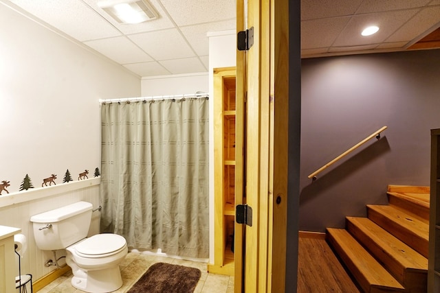 full bathroom with a drop ceiling, toilet, a shower with shower curtain, vanity, and recessed lighting
