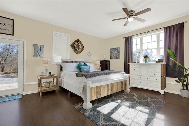 bedroom featuring dark wood-type flooring and ceiling fan