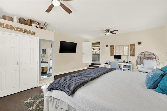 bedroom featuring dark wood-type flooring, a closet, and ceiling fan